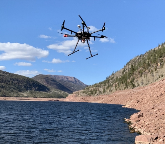 AggieAir UAV above a lake