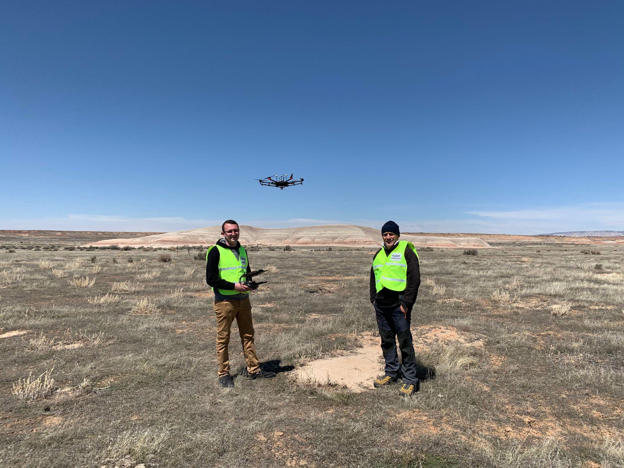 The AggieAir Service Center Team with UAV Matrice above the prairie dog town. 